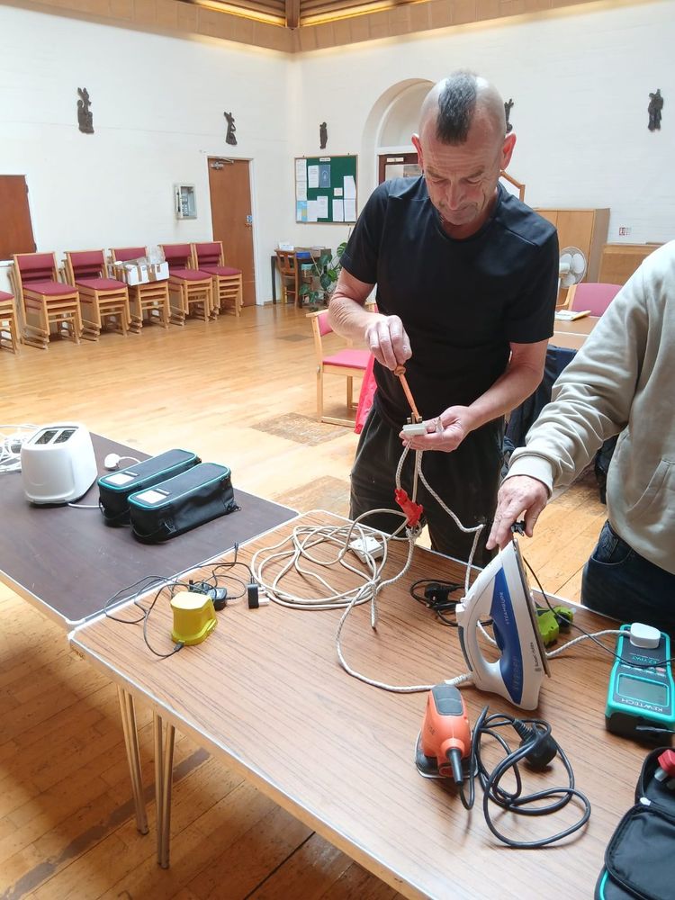 Inspecting a steam iron during the PAT course